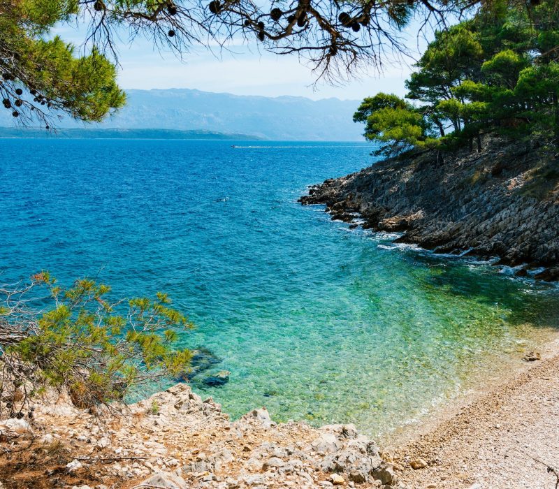 Beautiful beach in hidden cove on coast of Pag Island in Croatia.